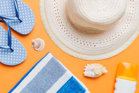 Summer vacation concept flat lay. beach accessories and towel top view. Space for text. travel...