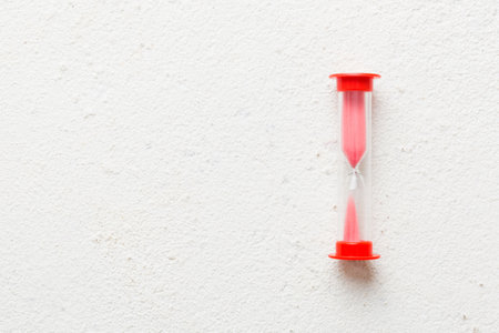 hourglass on the table, sand clock as time passing concept for business deadline, copy space.