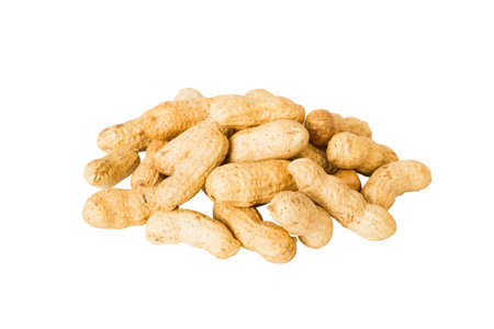 pile unpeeled peanuts isolated on white background, top view. Flat lay Healthy food concept.