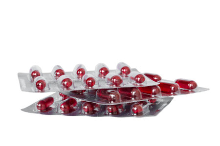 too many different pill cartridges stacked. selective focus. Packs of blister pills with tablets....