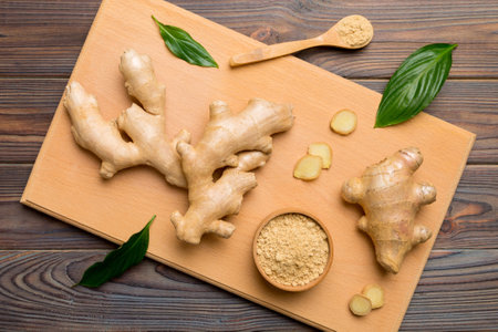 ginger on cutting board table, top view. Space for text.の写真素材
