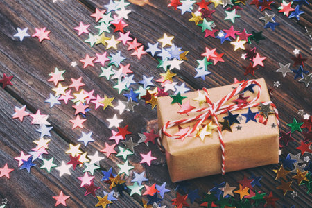 Christmas decoration with gift box for celebration with confetti Star best Christmas holidays background. Toned.の写真素材