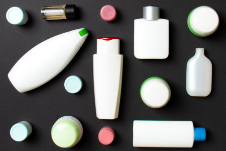 Group of plastic bodycare bottle Flat lay composition with cosmetic products on colored background empty space for you design. Set of White Cosmetic containers, top view with copy space.の写真素材