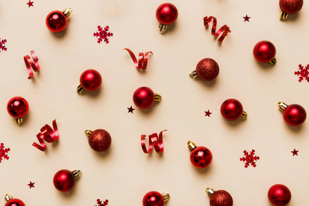 christmas composition. a pattern of christmas balls on colored background. Flat lay, top view New...