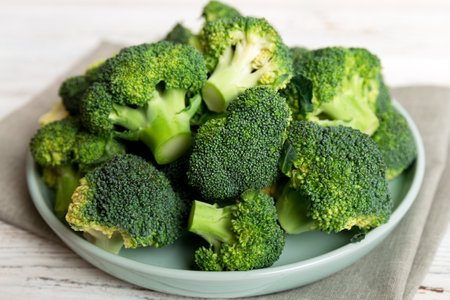 broccoli of fresh green broccoli in bowl over colored background. , close up. fresh vegetable.の写真素材