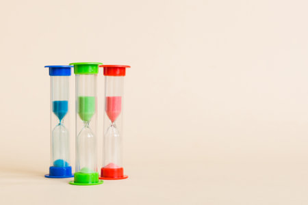 hourglass on the table, sand clock as time passing concept for business deadline, copy space.