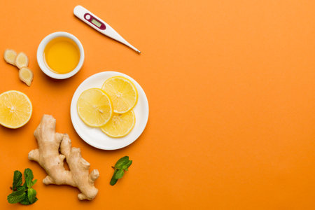 Natural cold and flu home remedies and thermometer. Natural ingredients for immunity stimulation and...