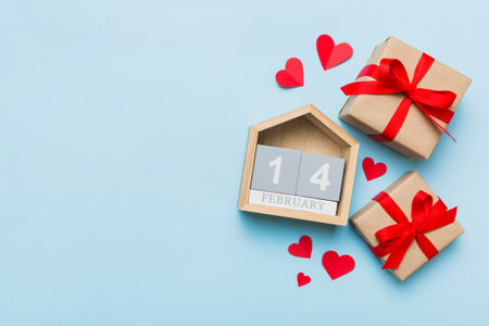 Valentine Day theme with wooden block calendar. Greeting card template for Valentines Day.copy space...