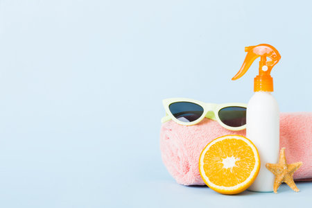 dispenser bottle and Citrus fruit in skincare product. beauty spa medical skincare and cosmetic lotion bottle cream product on table decor background with summer accessories.の写真素材