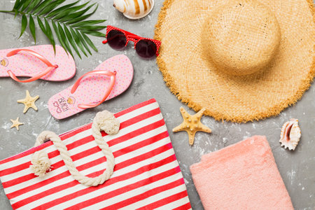 Composition with stylish beach accessories on colored background, top view. Beach fashion flat lay, summer concept. Trendy colors.の写真素材