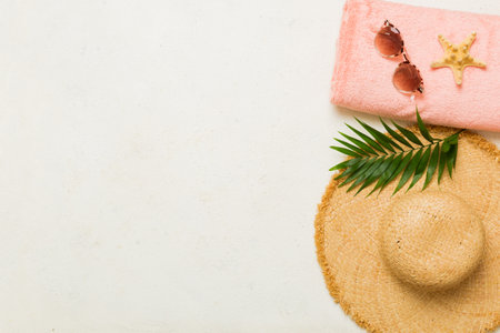 Top view travel or vacation concept. Composition with stylish beach accessories on colored background, top view. Beach fashion flat lay, summer concept. Trendy colors.の写真素材