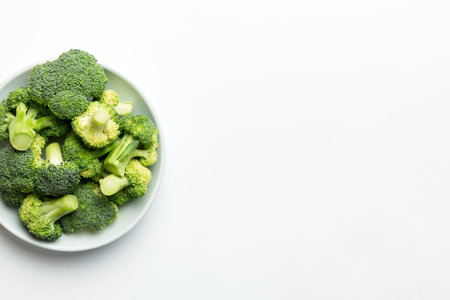 broccoli of fresh green broccoli in bowl over colored background. , close up. fresh vegetable.の写真素材