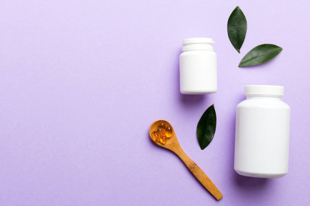 supplement pills with medicine bottle health care and medical top view. Vitamin tablets. Top view...