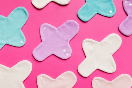 Eco-friendly reusable fabric women's pads. set of colorful bright reusable menstrual pads. zero waste woman periods concept top view with copy space.の写真素材