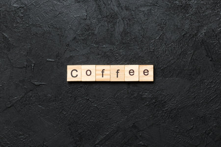 coffee written word on wood block. coffee text on table.