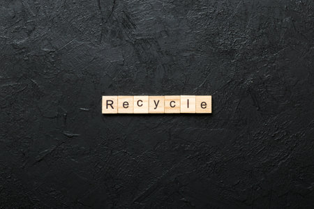recycle word written on wood block.の写真素材