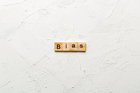 BIAS word written on wood block. BIAS text on cement table for your design, concept.