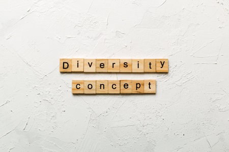 Diversity concept word written on wood block. Diversity concept text on cement table for your design.の写真素材