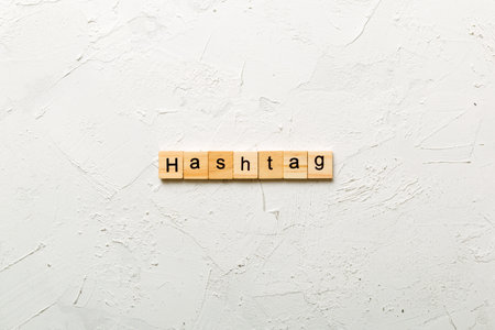 hashtag word written on wood block. hashtag text on table, concept.の写真素材