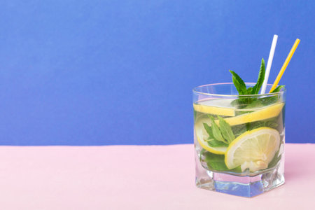 Mojito summer refreshing cocktail with ice and mint. mojito cocktail with lime, lemon and mint in a...