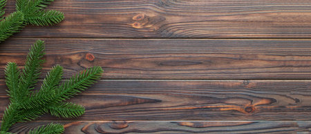 Christmas holiday background with copy space for advertising text. Fir branches on color background. Flat lay, top view.の写真素材