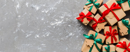 wrapped christmas or other holiday handmade present in paper with colored ribbon. Present box,...