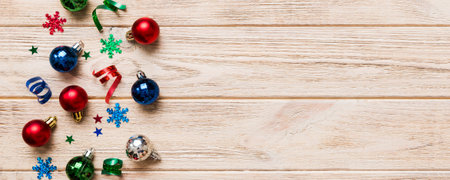 Christmas composition. a pattern of christmas balls on colored background. Flat lay, top view New year decor.の写真素材