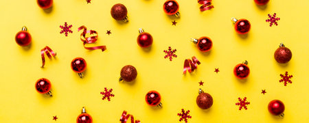 Christmas composition. a pattern of christmas balls on colored background. Flat lay, top view New year decor.の写真素材