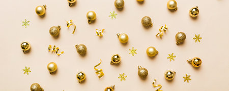 Christmas composition. a pattern of christmas balls on colored background. Flat lay, top view New year decor.の写真素材