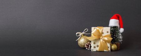 Christmas composition. craft Gift box, small tree, branches and craft DIY decorations on white...