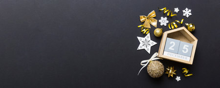 Christmas calendar 25 December. Christmas gift, fir branches, pine cones. Flat lay, top view. New...