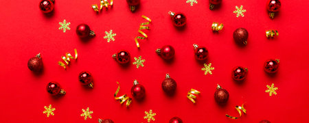 Christmas composition. a pattern of christmas balls on colored background. Flat lay, top view New year decor.の写真素材