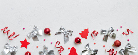 New Year composition white christmas snowflakes. Christmas decor background with pine cones. Top view with copy space.の写真素材
