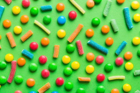 colorful candies as background top view. Seamless pattern with candy. Many sweet candies close-up.の写真素材