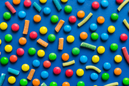 colorful candies as background top view. Seamless pattern with candy. Many sweet candies close-up.の写真素材
