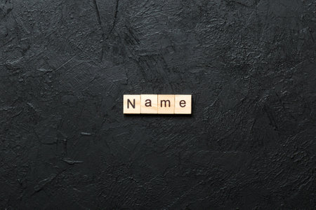 word written on wood block. text on cement table for your design, concept.の写真素材