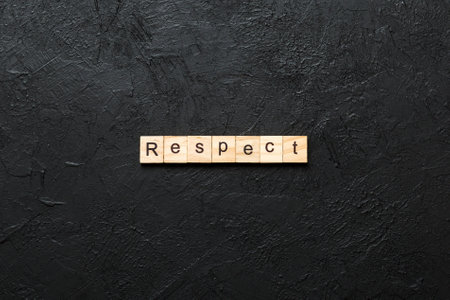 respect written word on wood block. respect text on table, concept.の写真素材