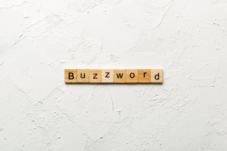 BUZZWORD word written on wood block. BUZZWORD text on cement table for your design, concept.