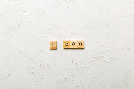 i can word written on wood block. i can text on cement table for your design, concept.の写真素材