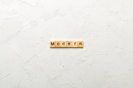 modern written word on wood block. modern text for your design, concept.の写真素材