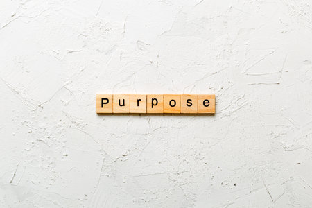 purpose written word on wood block. purpose text on table, concept.の写真素材