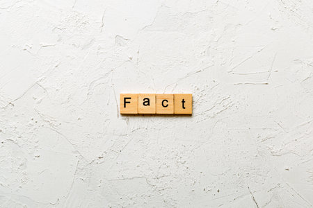 extrovert word written on wood block. extrovert text on table, concept.の写真素材