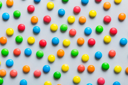 colorful candies as background top view. Seamless pattern with candy. Many sweet candies close-up.