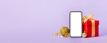 Digital phone mock up with rustic Christmas decorations for app presentation with empty space for...