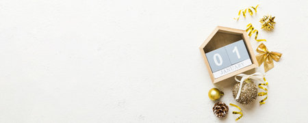 Christmas calendar 1 January. Christmas gift, fir branches, pine cones. Flat lay, top view. New Year...