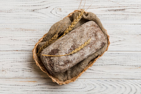 Freshly baked bread on basket against natural background. top view bread copy space.の写真素材