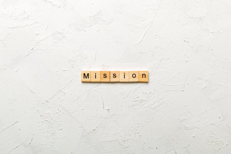 MISSION word written on wood block. MISSION text on table, concept.の写真素材