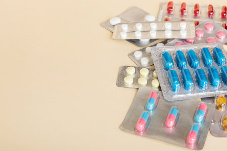 too many different pills of various blisters with different pills Medicines storage at home concept Medication storing. A pile of medicine in blister packs. Pharmaceutical blister packs.の写真素材