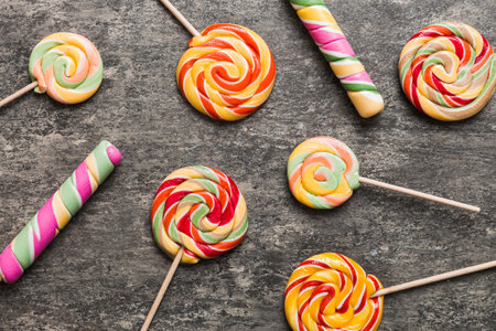 Set of colorful lollipops on colored background. Summer concept. Party Happy Birthday or Minimalist Concept.の写真素材