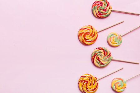 Set of colorful lollipops on colored background. Summer concept. Party Happy Birthday or Minimalist Concept.の写真素材